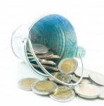 Thai Baht Coins On A Small Metal Bucket On A White Background Stock Photo