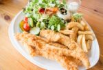 Gourmet Fish And Chips With Salad Stock Photo