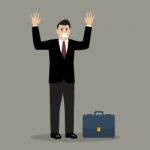 Businessman In A Suit Surrendering Stock Photo