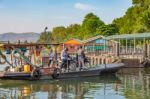 Ship Passenger And Motorbikes Across  Khwae Noi River At Kanchanaburi Thailand .december 2, 2018 Stock Photo