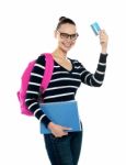 Young Lady Holding Credit Card Stock Photo