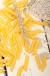 Italian Pasta Penne With Wheat Stock Photo