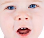 Toddler Blond And Blue Eyes Boy Child With Various Facial Expres Stock Photo