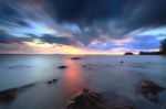 Long Exposure Seascape With Fantastic Rock Surface Stock Photo