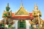 Two Giant In Front Of Wat Arun Temple Most Important Landmark Of Stock Photo