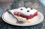 Close-up Of Delicious Raspberry Cake Isolated On White Stock Photo