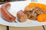 Beef Sausages Cooked On Iron Skillet Stock Photo