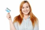 Young Lady Displaying Her Cash Card Stock Photo