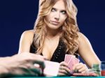 Woman Doubt In Gambling Match Stock Photo