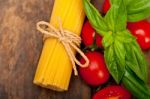 Italian Spaghetti Pasta Tomato And Basil Stock Photo