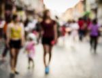 Blurred People Walking On The Street Stock Photo