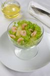 Salad Of Pineapple And Shrimp In Lettuce Leaves Stock Photo
