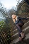 Blonde Caucasian Girl Posing Outdoors Stock Photo