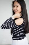 Portrait Of Thai Student Teen Beautiful Girl Relax And Smile Stock Photo