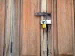 Wooden Door Of Old Barn With Lock And Chain Stock Photo