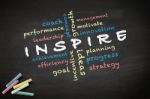 Inspire Written On Blackboard Stock Photo