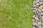 Stone On Grass Background Stock Photo