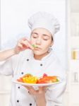 Chef Smell Mint And Hold Plate Of Fruit Stock Photo