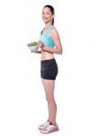 Charming Young Lady Eating Salad Stock Photo