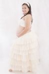 Portrait Of Adorable Pregnant Woman In Antique Dress Stock Photo