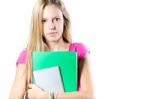 Young Student Woman With Her Books On White Background Stock Photo