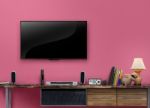 Led Tv On Concrete Wall With Wooden Furniture In Living Room Stock Photo