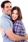 Happy Lovers Hug Each Other Stock Photo