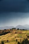 Spring Rain In Mountains. Thunder And Clouds Stock Photo