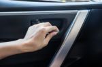 Woman Driver Pressing Button Locking And Unlocking Doors In Car Stock Photo