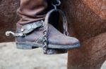 Cowboy Boot With Spur And Horse Stock Photo