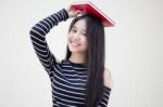 Portrait Of Thai Teen Beautiful Girl Reading Book Stock Photo