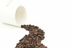 Coffee Beans And Coffee Cup Stock Photo