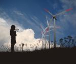 small Girl holding toy windmill Stock Photo