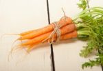 Baby Carrots Bunch Tied With Rope Stock Photo