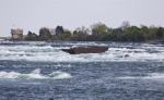 Beautiful Image With A Broken Boat On The River Right Before The Amazing Niagara Falls Stock Photo