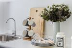 Modern White Pantry With Shelf Stock Photo