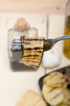 Grilled Eggplant Oubergine On A Fork Stock Photo