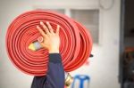 Red Hose Fire Stock Photo