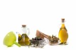 Green And Black Olives With Olive Oil Bottles Stock Photo