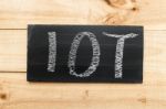 Blackboard Written With The Letters Iot, The Internet Of Things Stock Photo