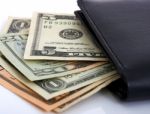 Cash In Black Wallet Stock Photo