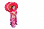 Asian Woman Wearing Japanese Traditional Kimono On White Background Stock Photo