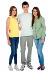 Smiling Teenage Friends Standing Stock Photo