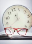 Red Glasses On The Book Stock Photo