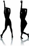 Silhouettes Of Dancing Women Stock Photo