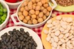 Variety Of Kitchen Ingredients With Fresh And Dried Legumes Stock Photo