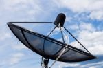 Satellite Transmission Isolated On Background Cloudy Sky Stock Photo