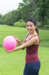 Asian Girl And Pink Ball Stock Photo