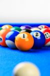 Billiard Balls In A Blue Pool Table Stock Photo