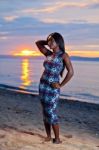 Beautiful Black African American Woman Posing On The Beach At Su Stock Photo